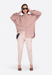 Model wearing classic long-sleeve beige shirt, stylish front view – East Vibe